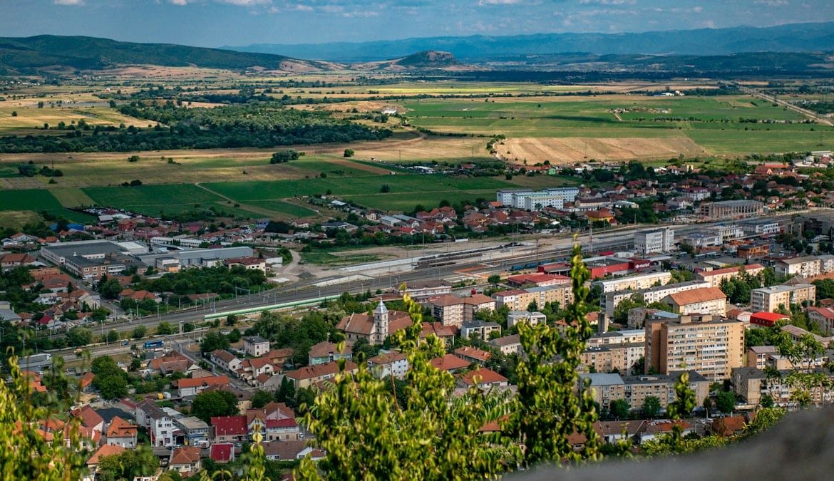 a view of a small town from a hill